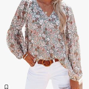Floral top, “New” Size large.(listed for $28 on Amazon)